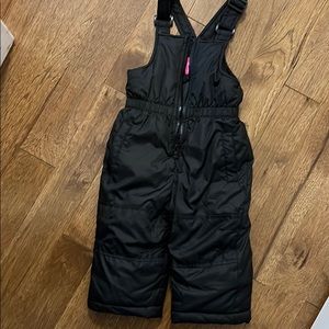 Black overall snowsuit